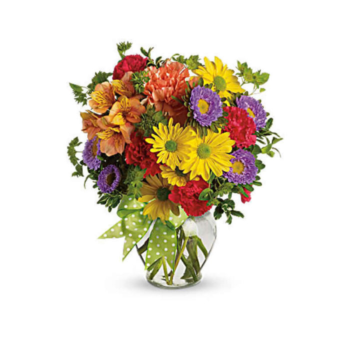 MIXED FLOWERS ARRANGEMENT IN A GLASS VASE